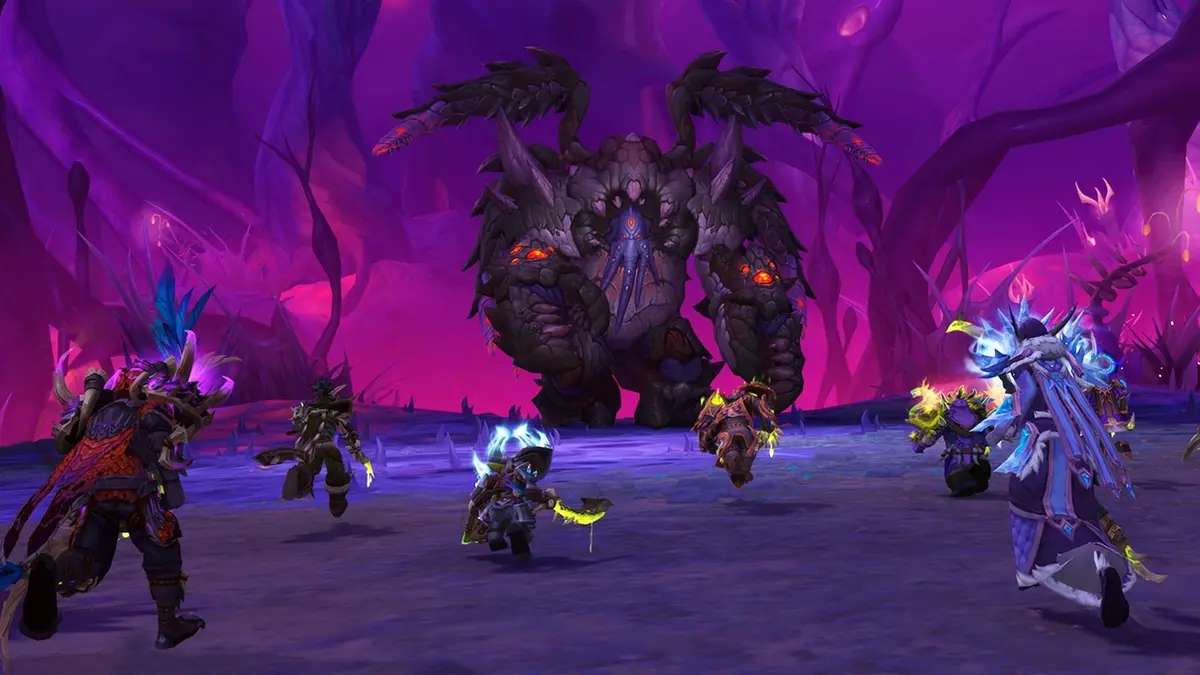 Official key art for the World of Warcraft: Midnight 12.1.5 content update, showing players fighting the armoured void creature Kith'ix in a purple-lit cavern