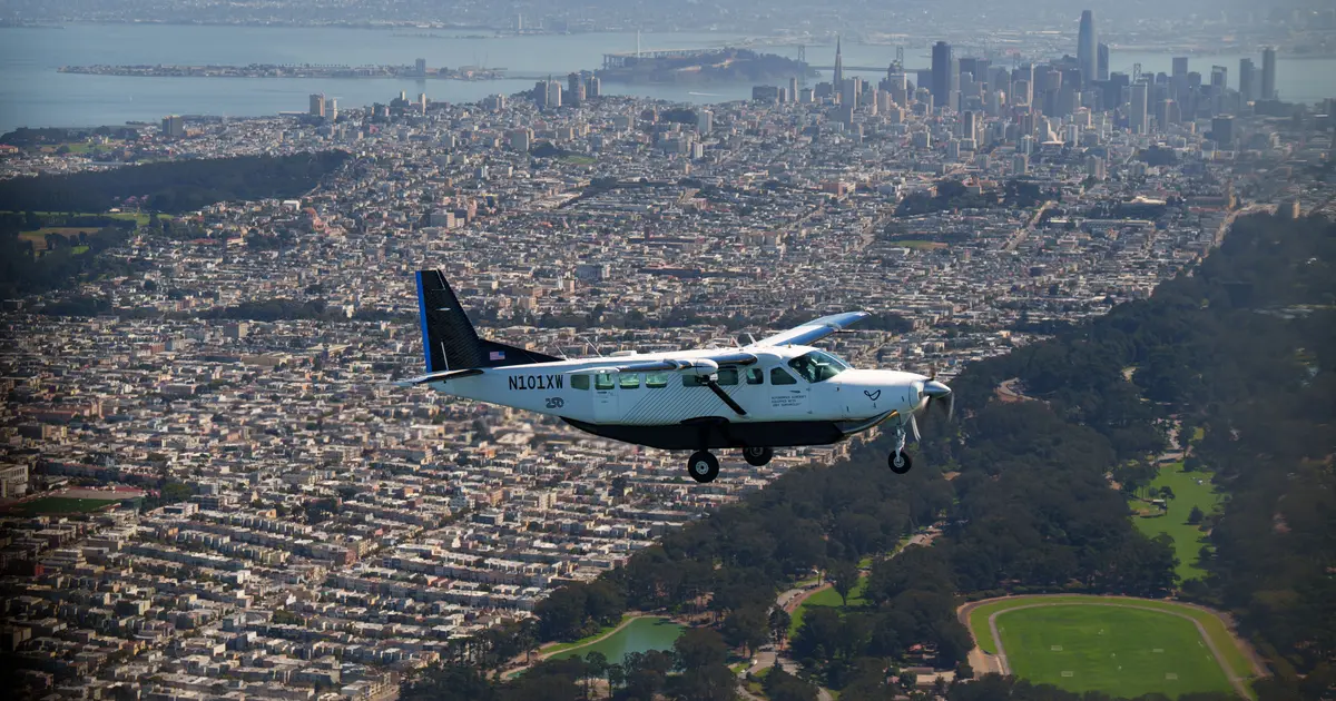 Joby's autonomy aircraft, a converted Cessna Caravan, in flight over San Francisco during its 3,199-mile autonomous transcontinental journey