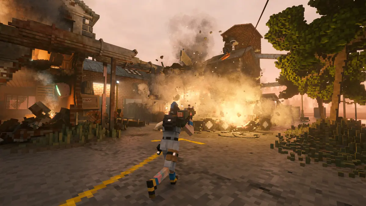 A Teardown character fires into a voxel building, blasting timber, glass and smoke across a street at dusk.