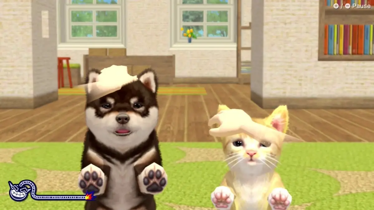 Supplied gameplay image showing virtual dogs and a cat in a Nintendogs-style home scene.