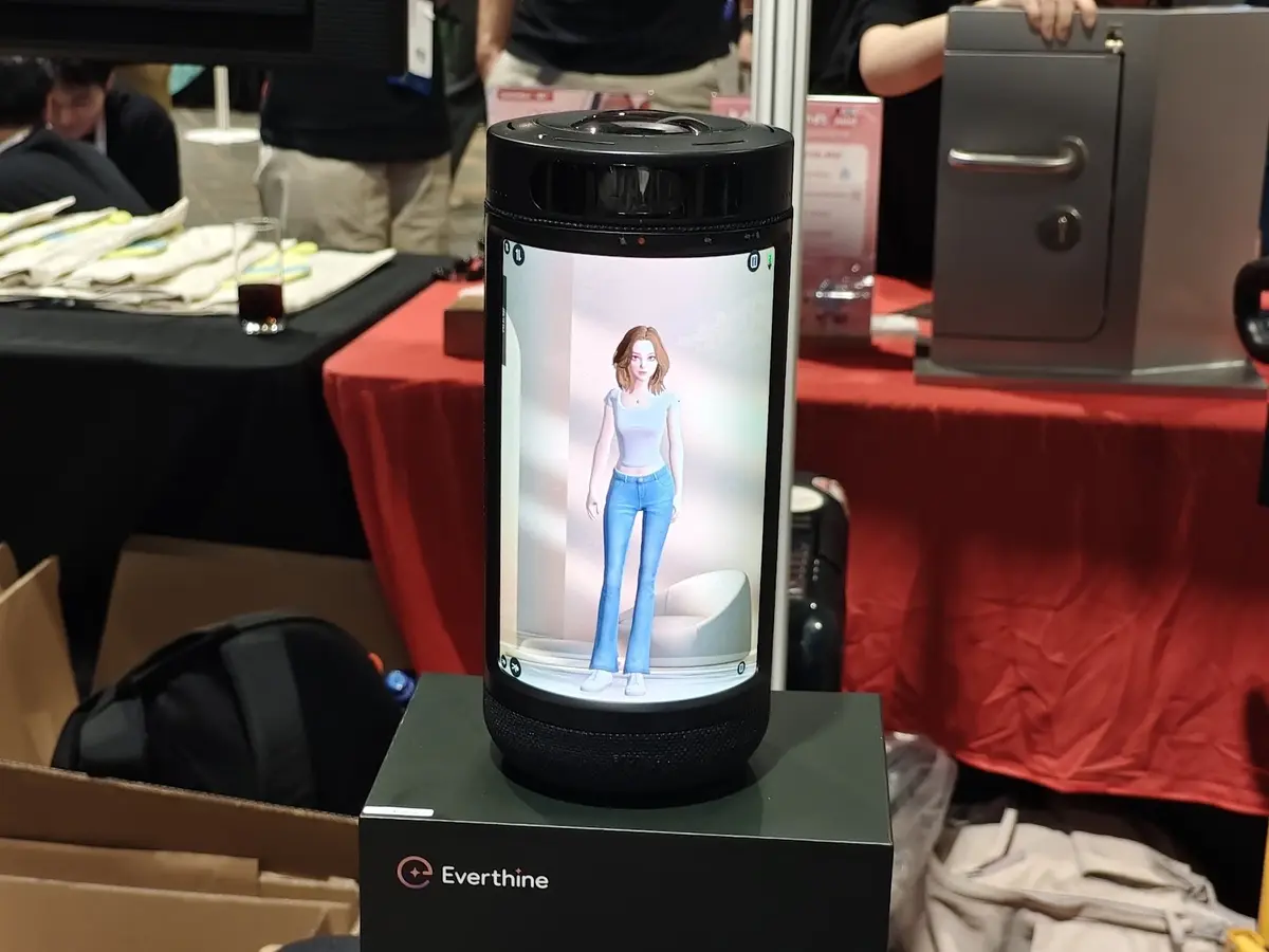 Everthine AI Companion displayed at IFA 2026, showing a customisable female 3D avatar on its vertical screen.