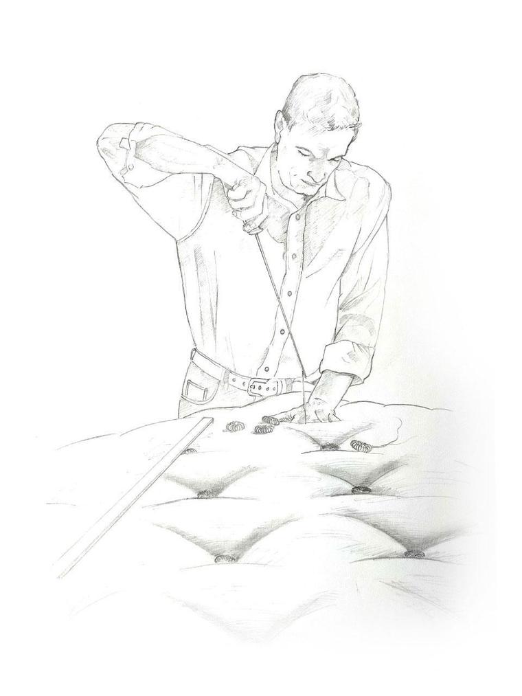 Hand tufting a luxury mattress