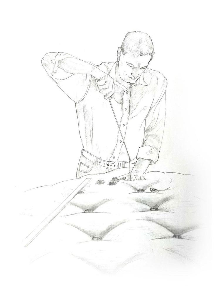 Hand tufting a luxury mattress