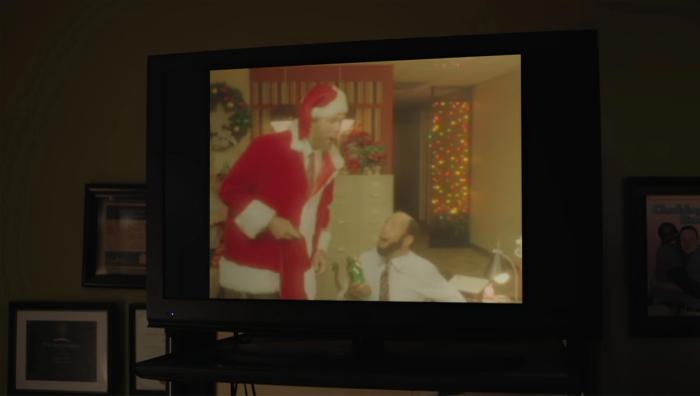 Whoa, what's Santa got old Wallace here? What? It's an empty bottle of gin, Wallace. We found so many in your desk, we figur