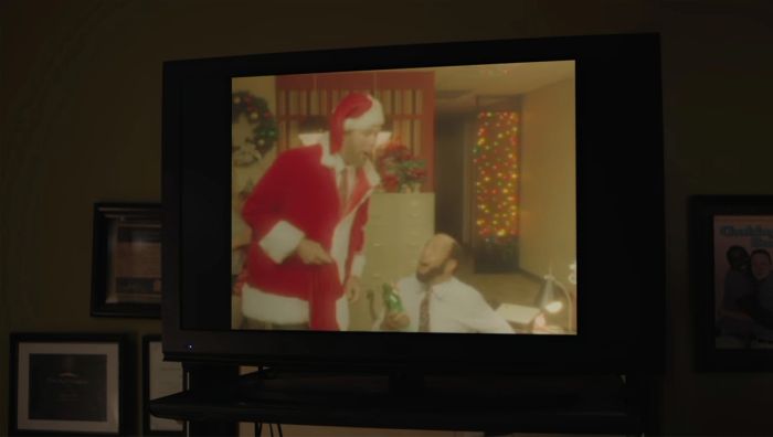 Whoa, what's Santa got old Wallace here? What? It's an empty bottle of gin, Wallace. We found so many in your desk, we figur