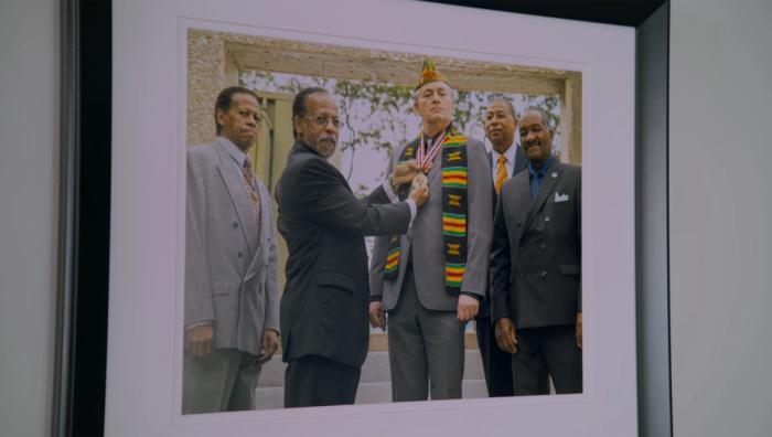 Sam, you'll be interested in this. It's the ceremony where I became an honorary black man. That's why I'm allowed to say the