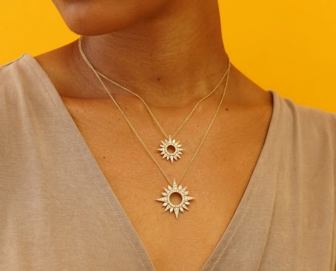 A photo of a woman wearing a Made by Malyia necklace