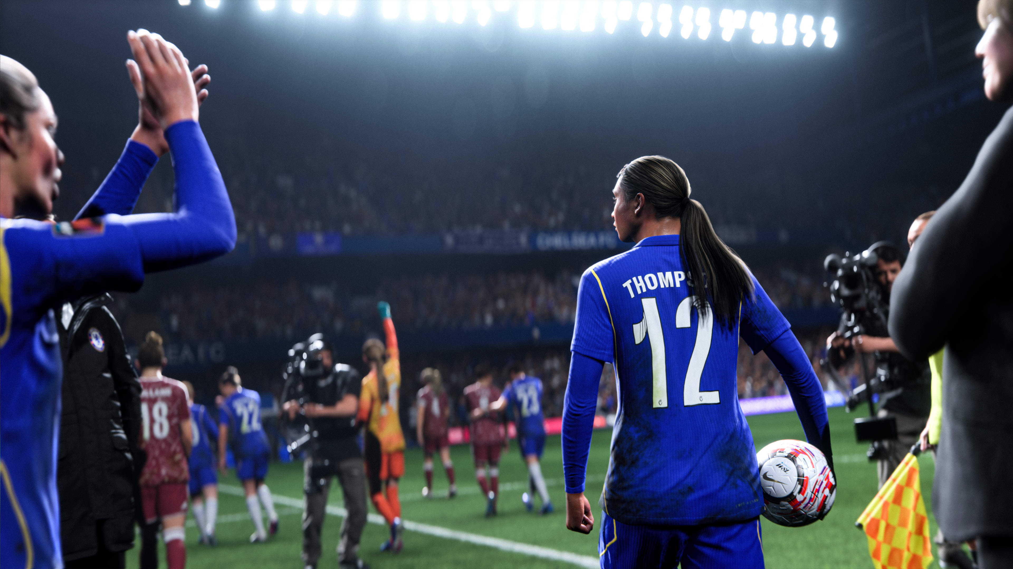 Alyssa Thompson leaves the pitch holding the match ball while teammates applaud in EA Sports FC 27.