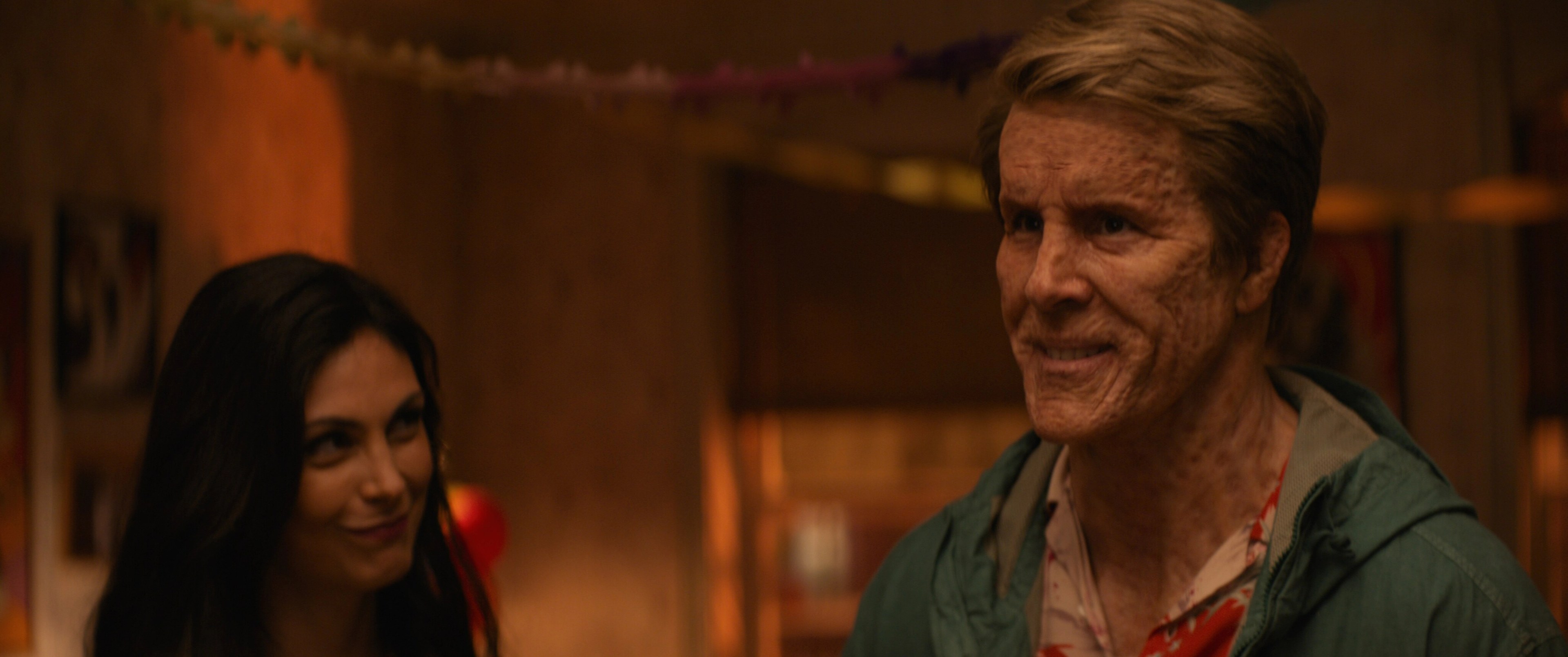 Peter and Vanessa stand together at a party in Deadpool & Wolverine.