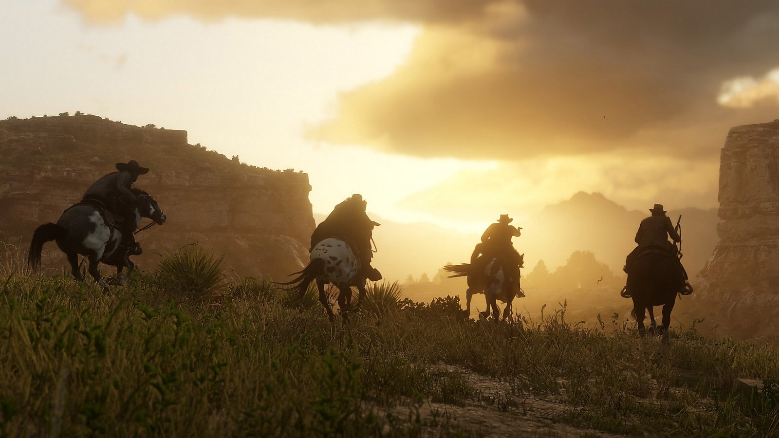Riders crossing open country in Red Dead Redemption 2.