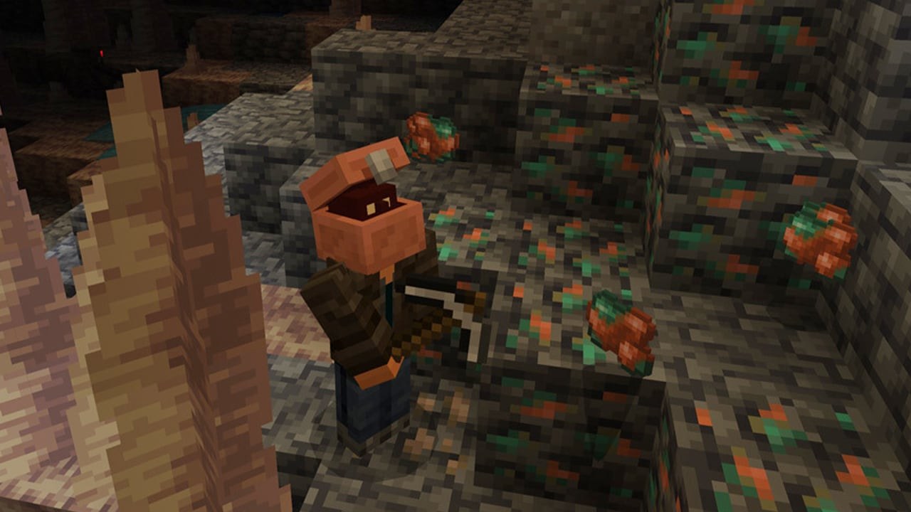A Minecraft player mining copper ore inside a cave.