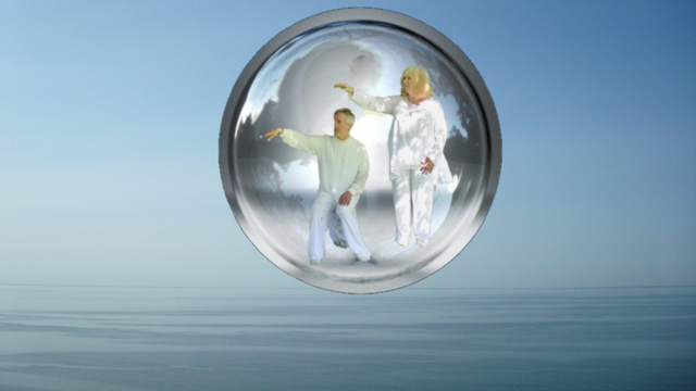 Ruthie and Alan in a QiKi bubble on the sky sea blend
