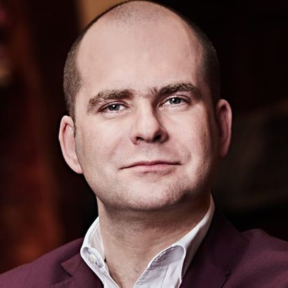 John Gilhooly OBE OSI