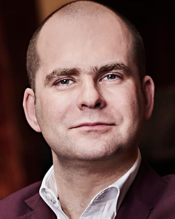 John Gilhooly OBE OSI