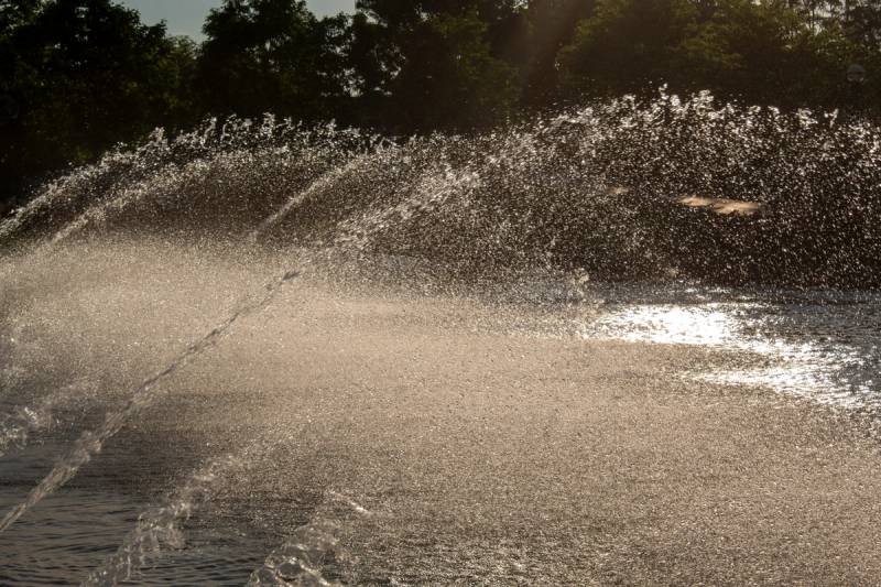Water fountain spraying in late afternoon sun in Frederick, Maryland