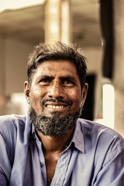 Omar Haddad, reviewer — professional headshot of a smiling bearded man.