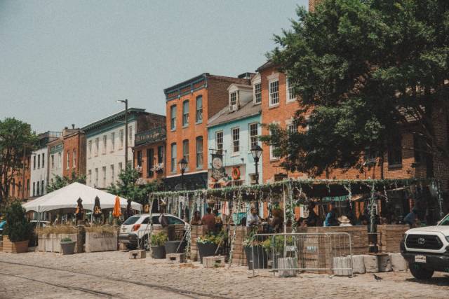 Colorful Baltimore row houses with outdoor cafes