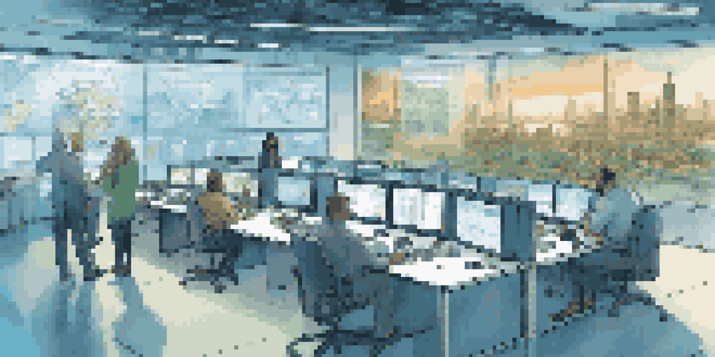 A modern digital command center illustrating supply chain operations with diverse people collaborating around a central table while large screens display real-time data.