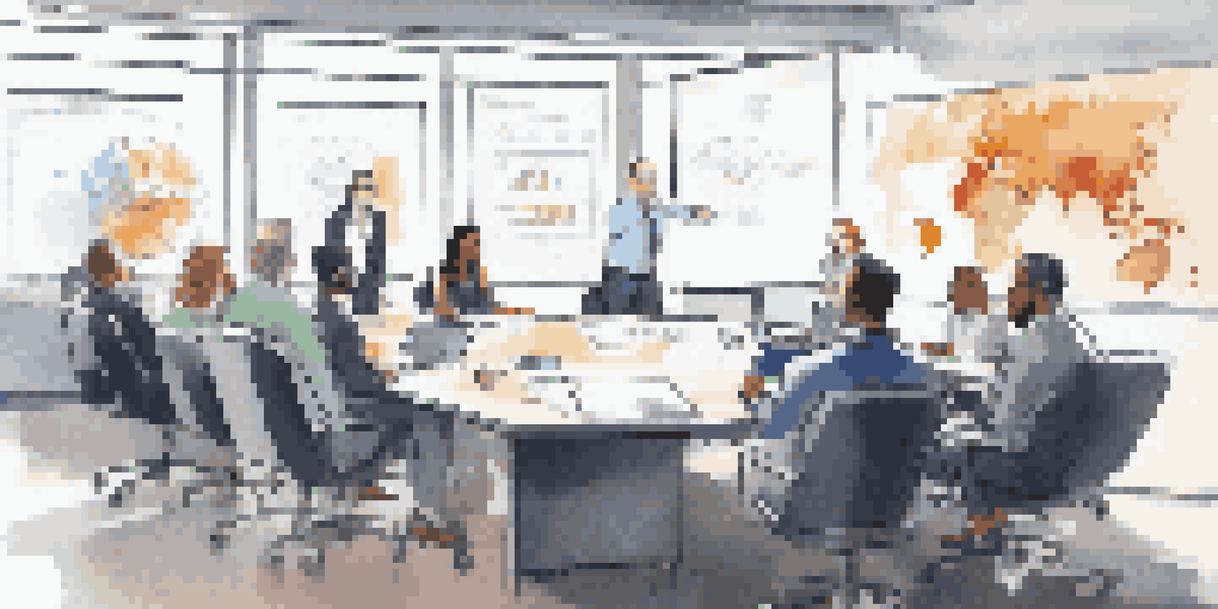 A diverse team in a modern conference room discussing financial data and strategies, with charts displayed on a screen.