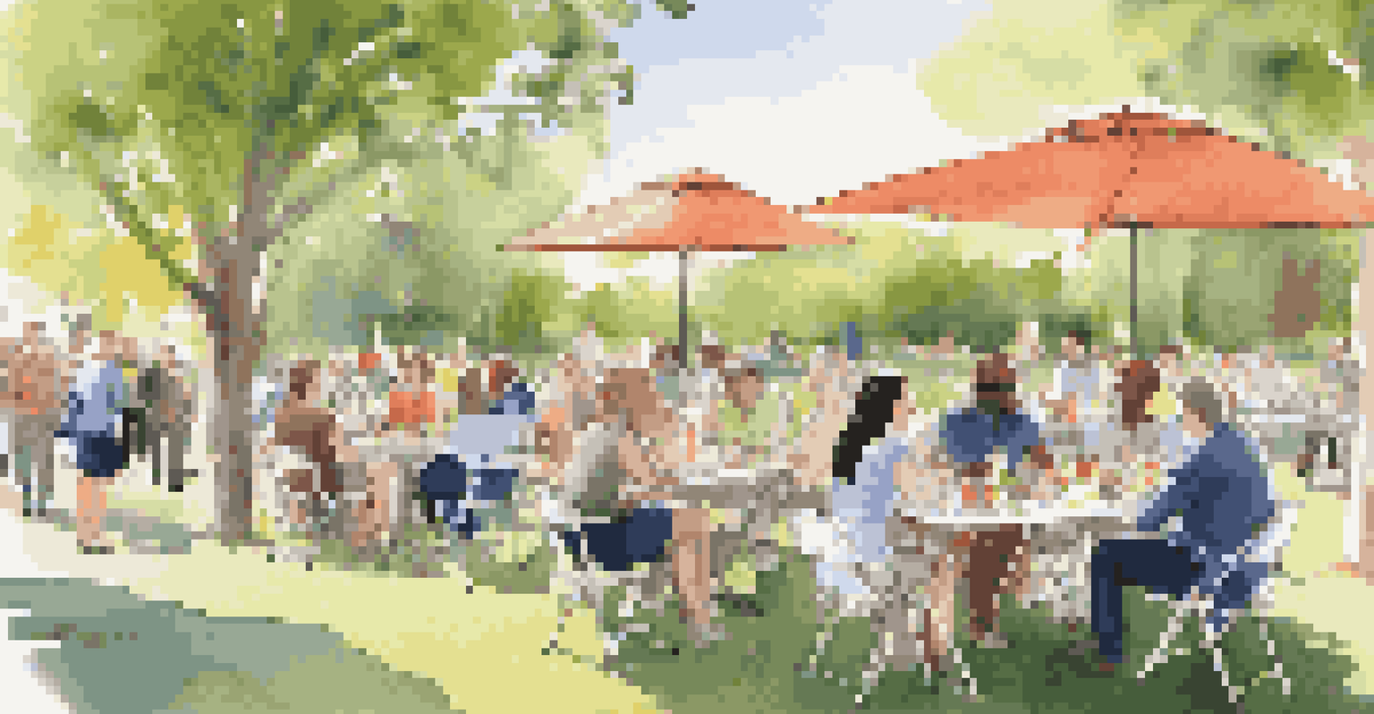 Professionals networking outdoors in a park, seated at picnic tables with flowers and drinks, engaged in conversation.