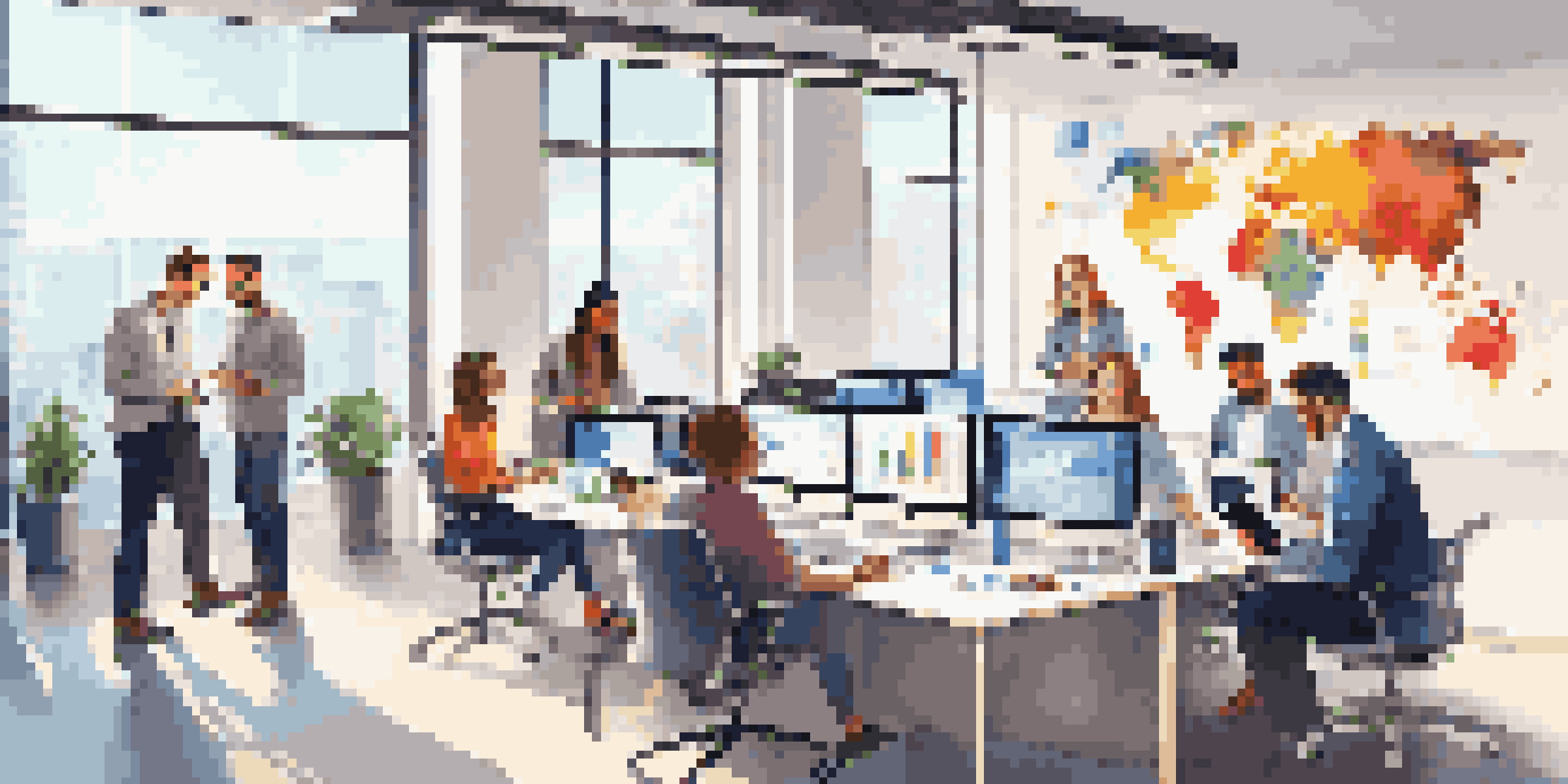 A diverse marketing team analyzing data in a bright office with charts on the walls.