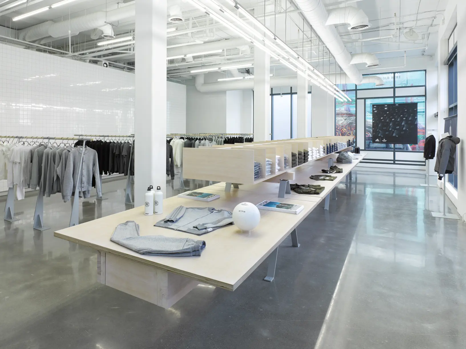 Interior image of retail store, Reigning Champ, a premium Canadian athletic wear and streetwear brand , located at 41 Ossington taken by A-Frame Studios