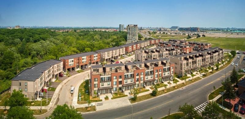 Aerial view of a curving townhouse development