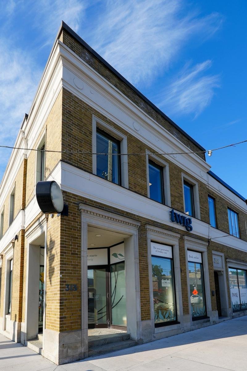 Yellow-brick corner retail building