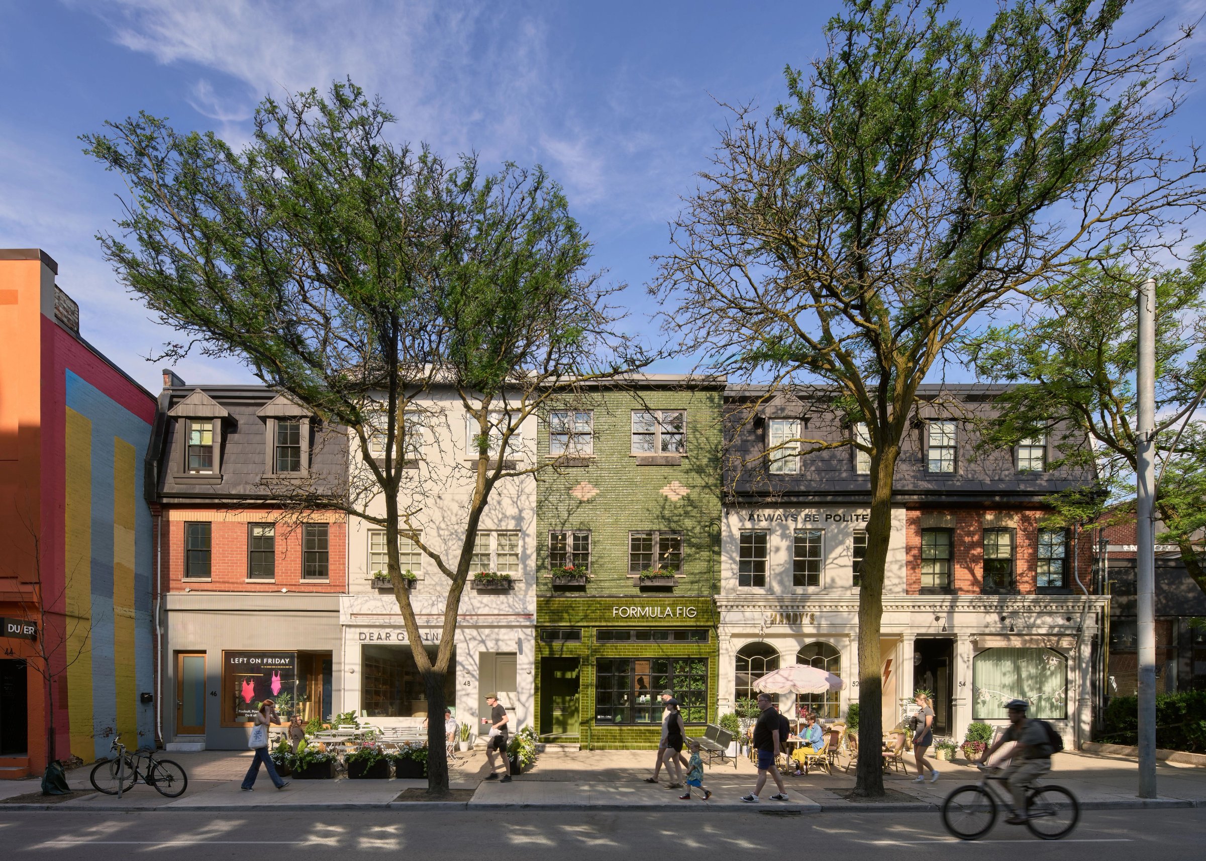 Victorian storefronts and street trees on Ossington