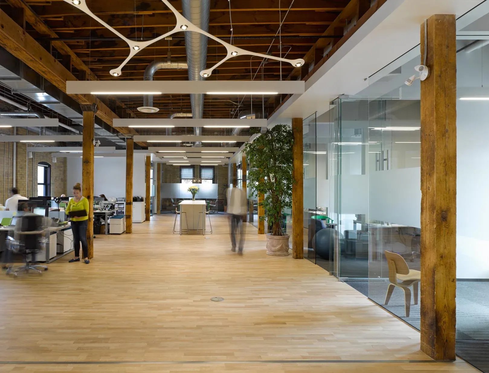Open-plan office with heavy timber posts