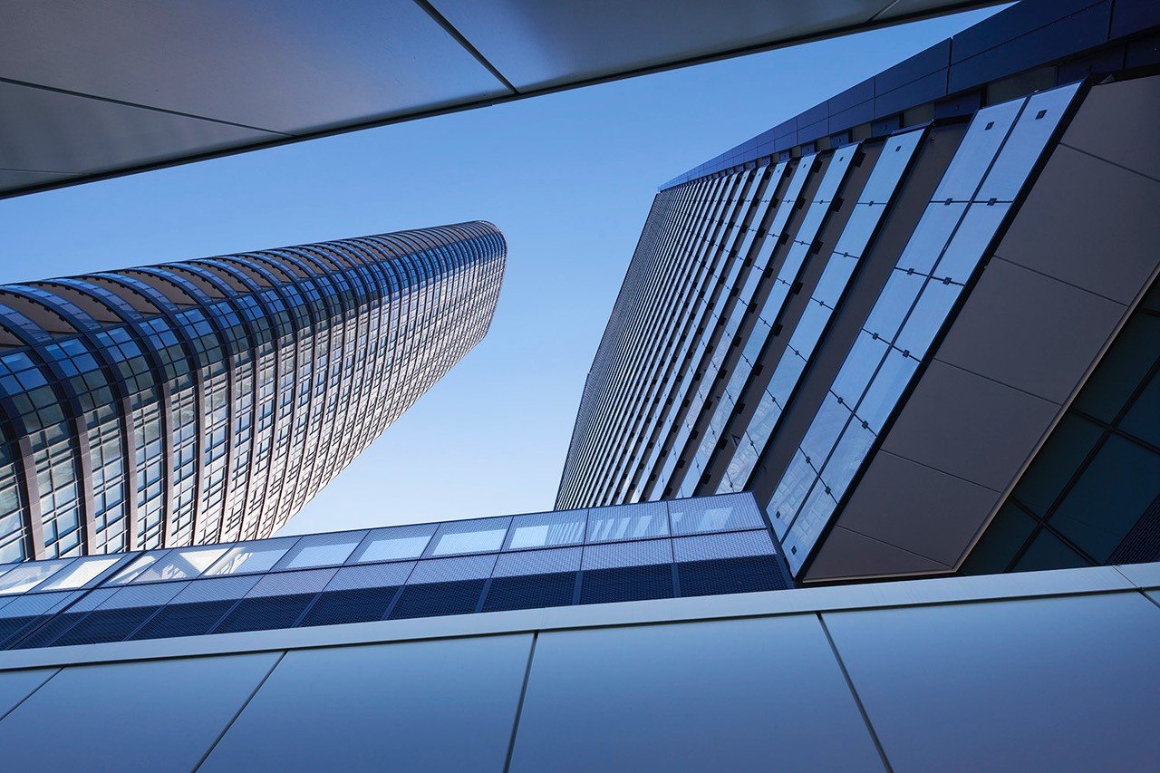 Upward view of the Via Bloor glass towers