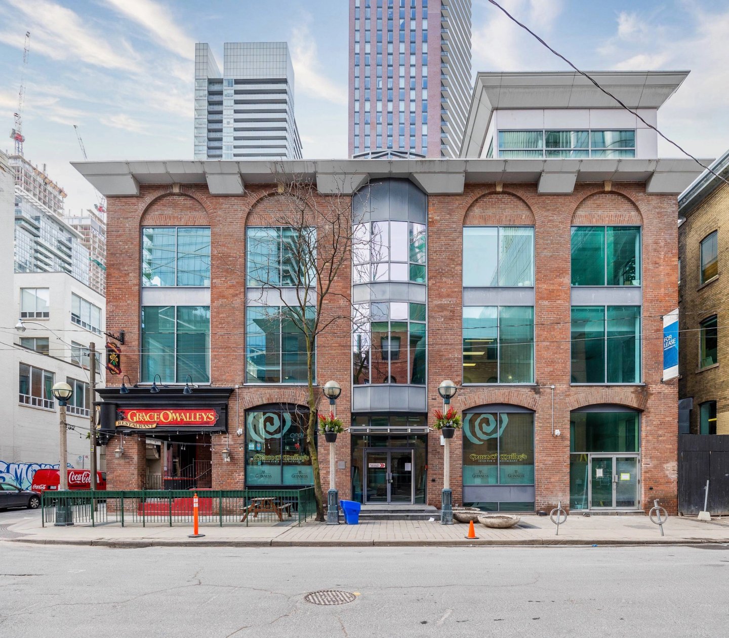 Exterior shot at the ground level of 14 Duncan, located downtown, a retail and office building 