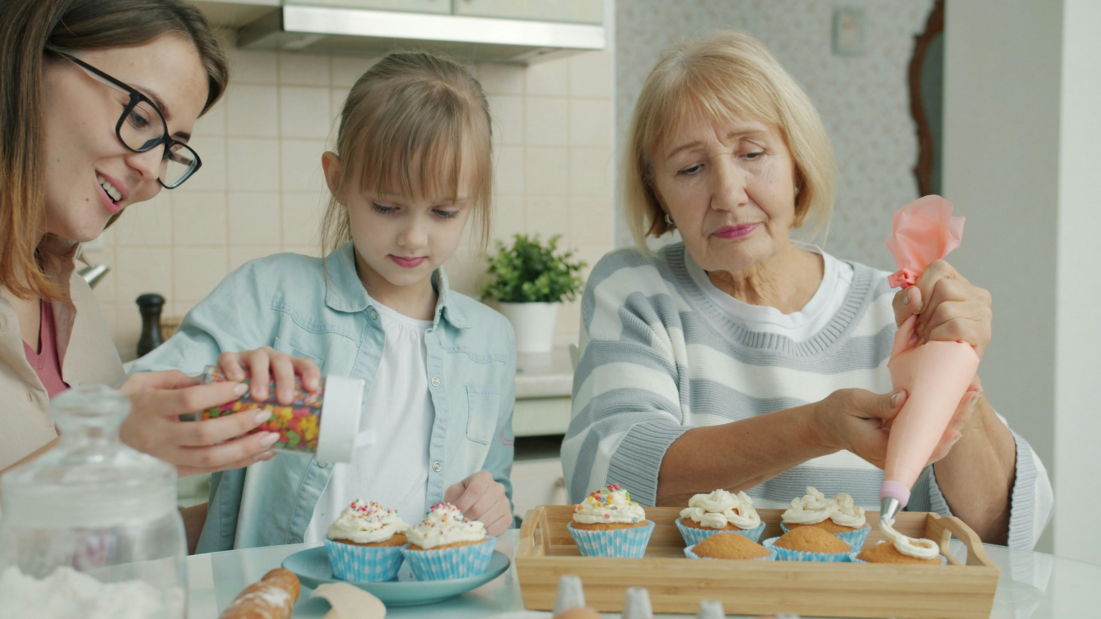 Grandma cooking with mom and child
