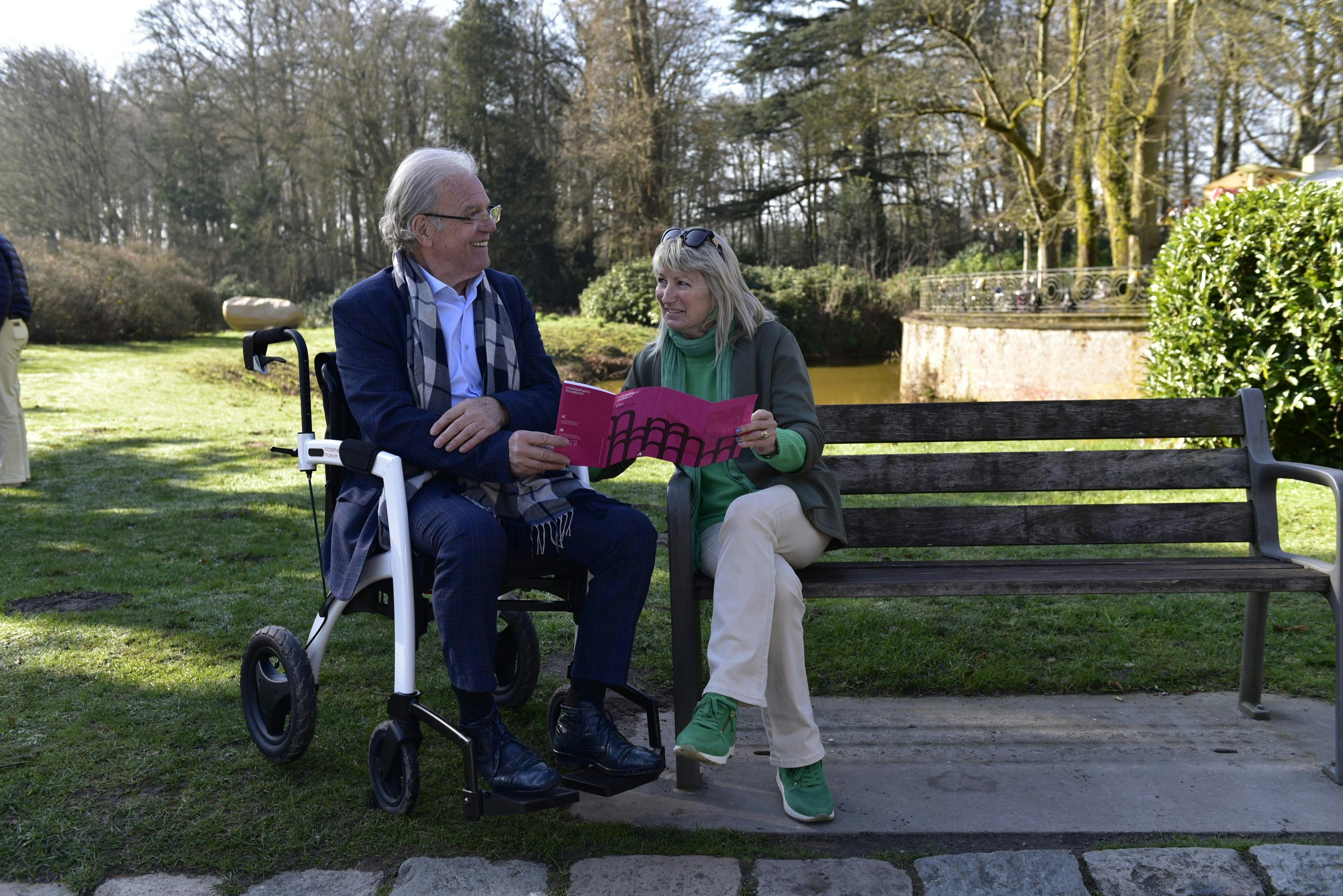 Older people on a park bench