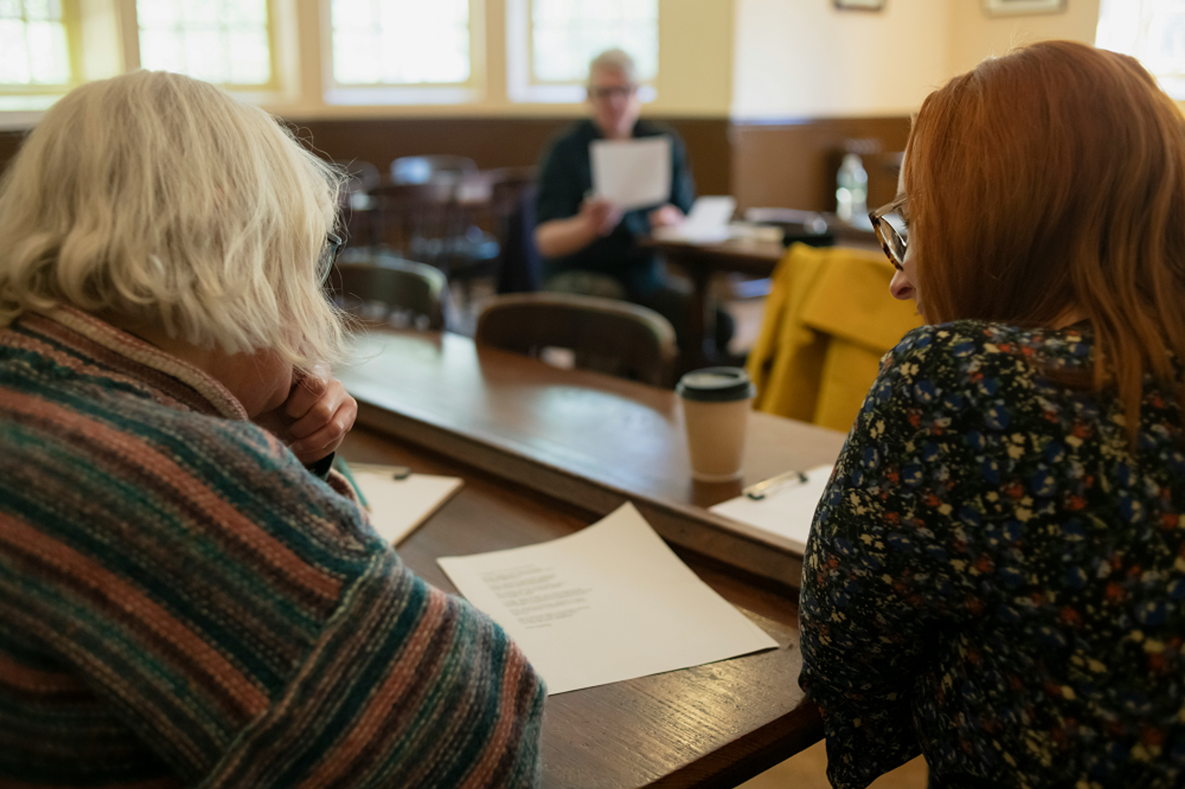 two people writing memoirs