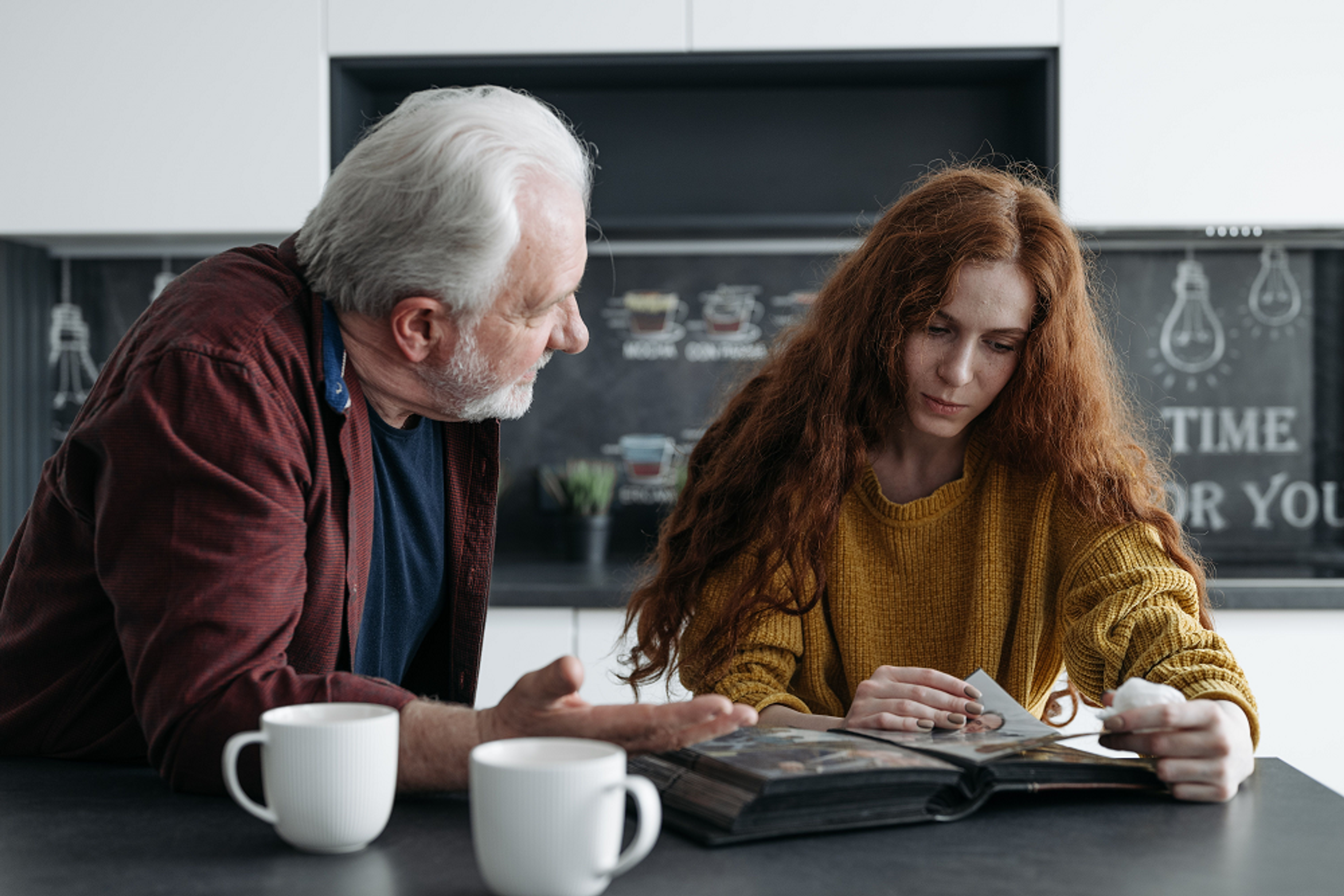  a person helping another person with a memoir