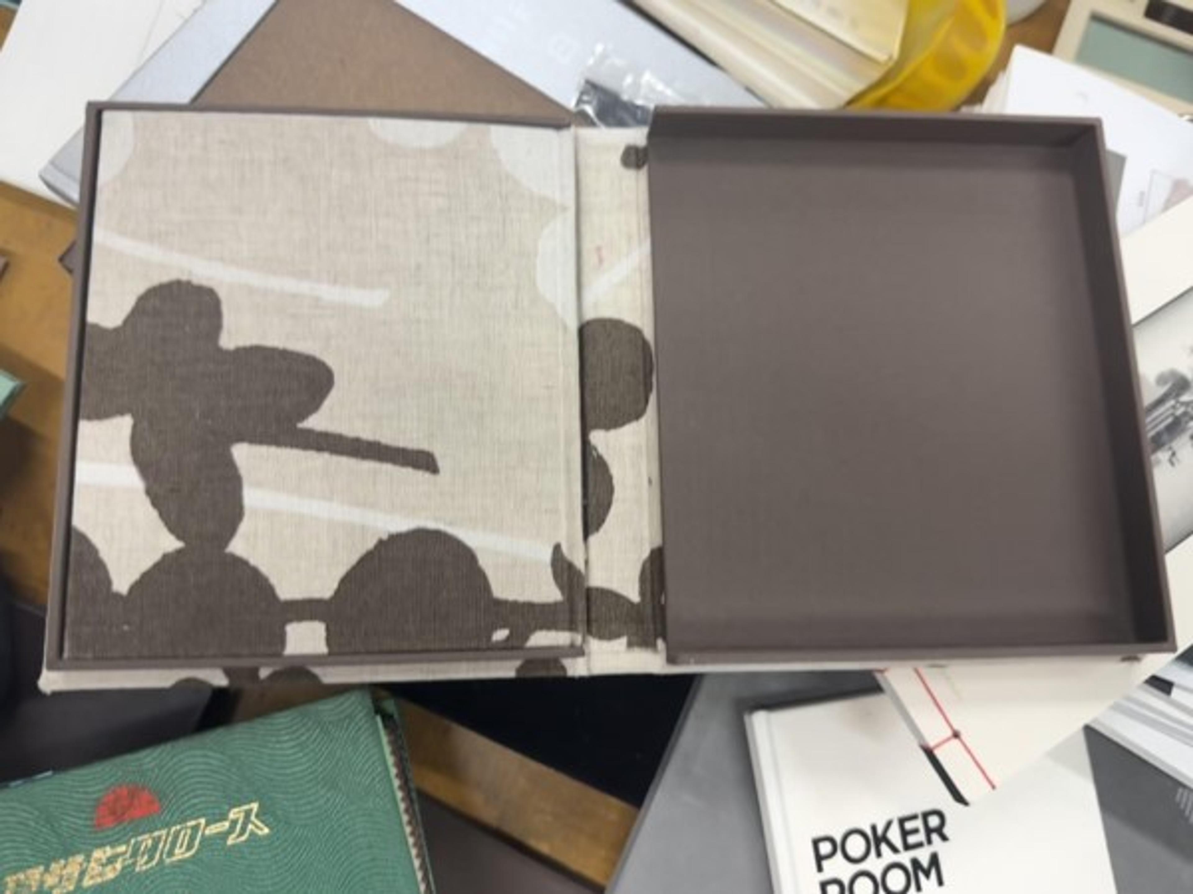 A fitted box can be designed as part of the book rather than added as generic packaging