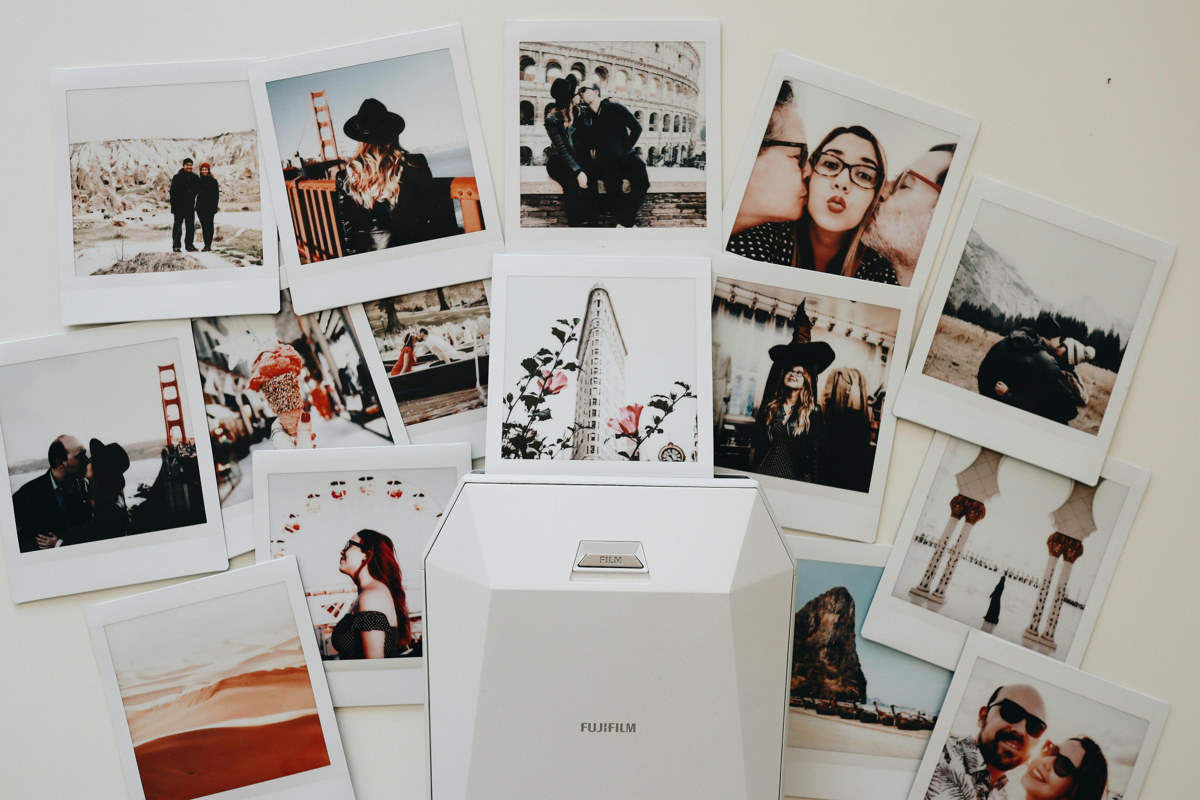 Photographs laid out on a table