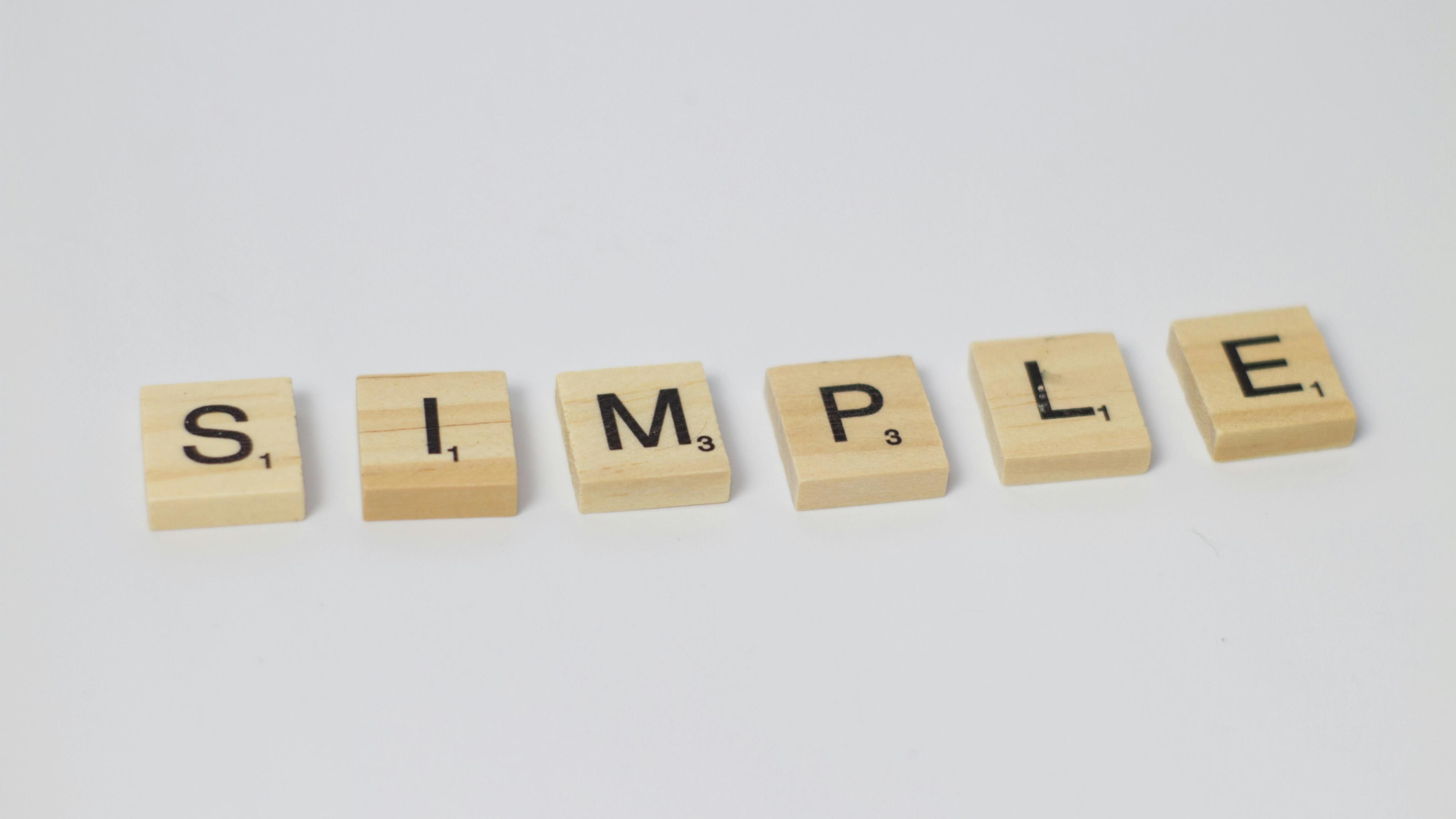 Simple spelt out in scrabble tiles