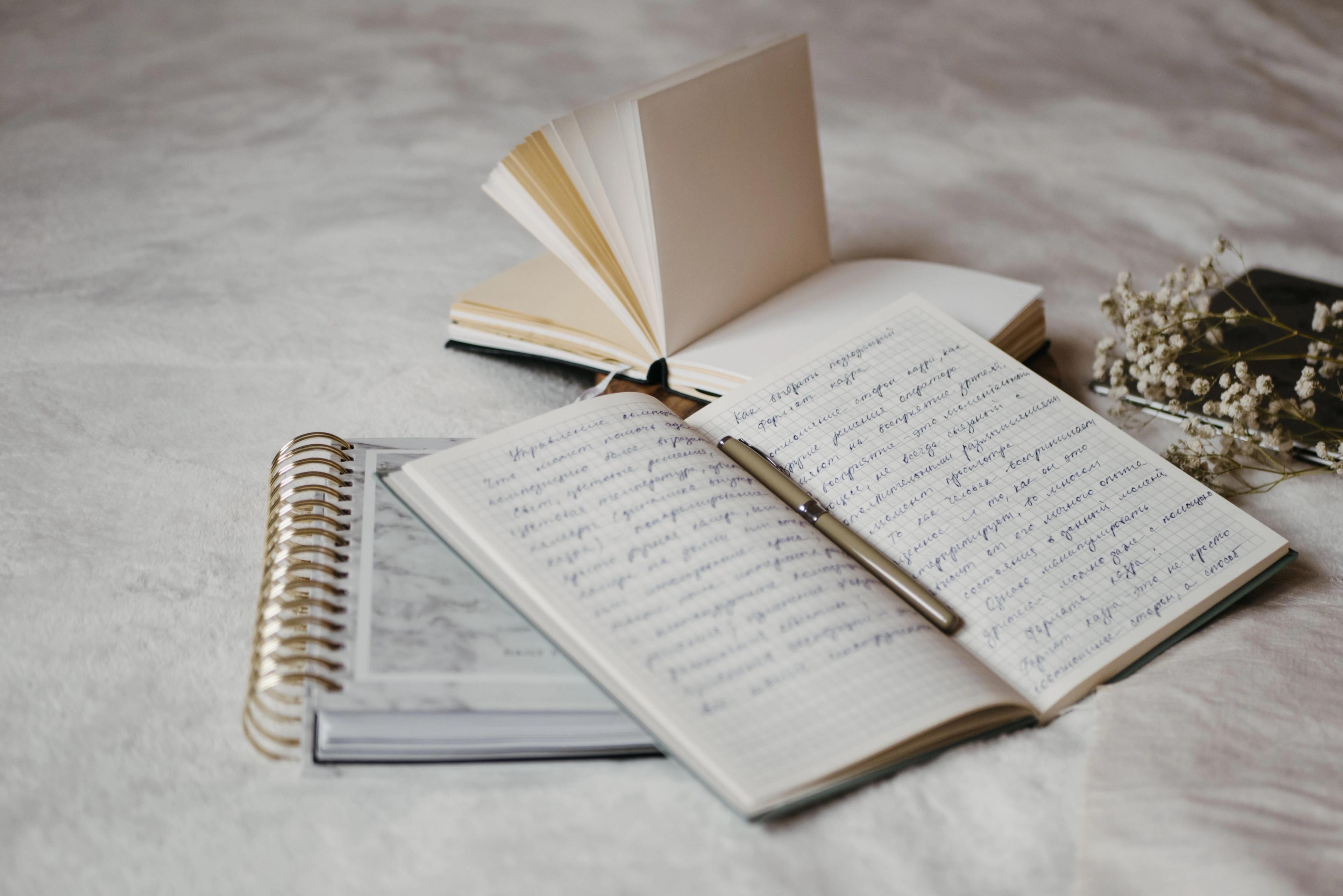 An open journal with lots of written words
