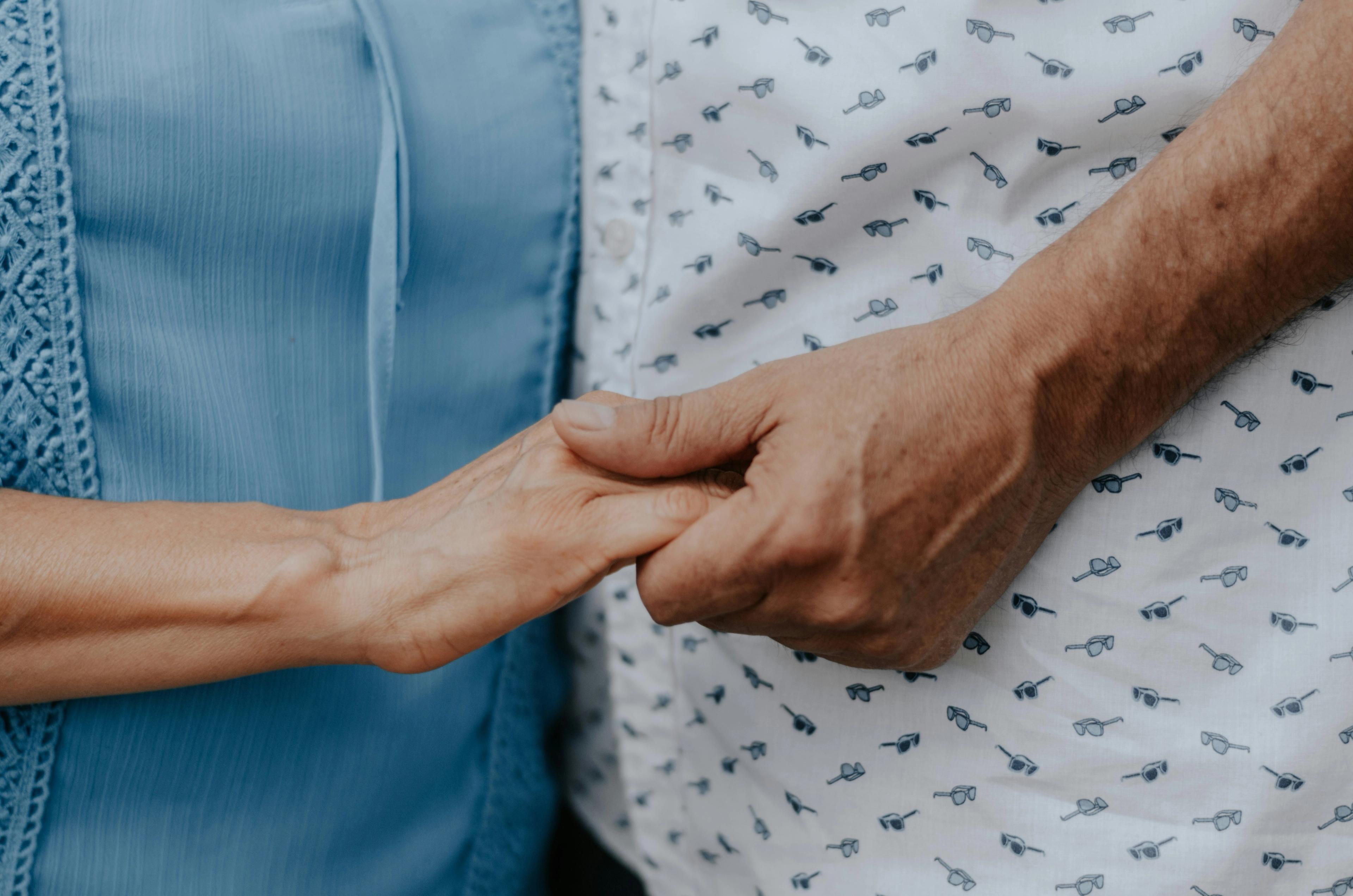 Hands holding each other