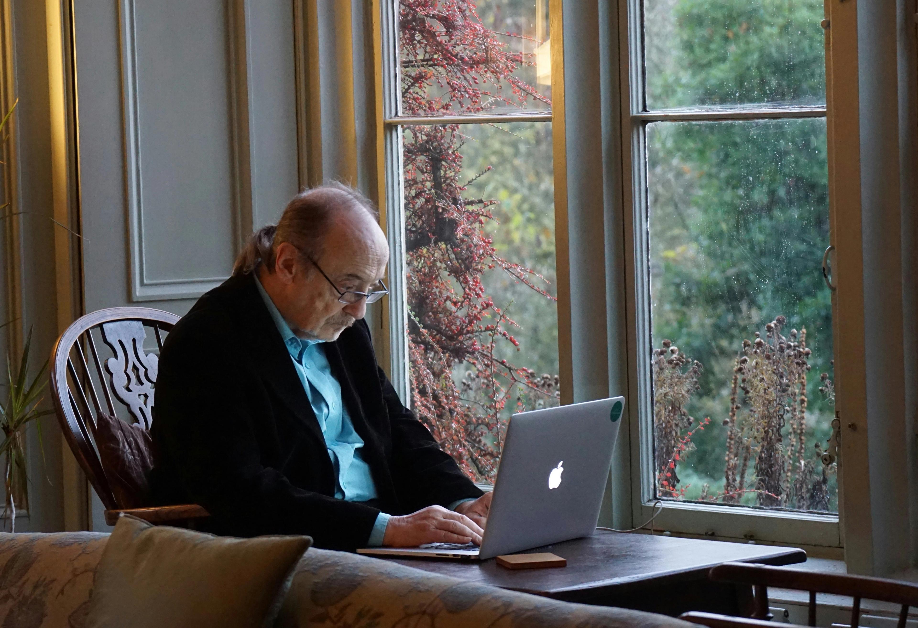 Older person writing life story