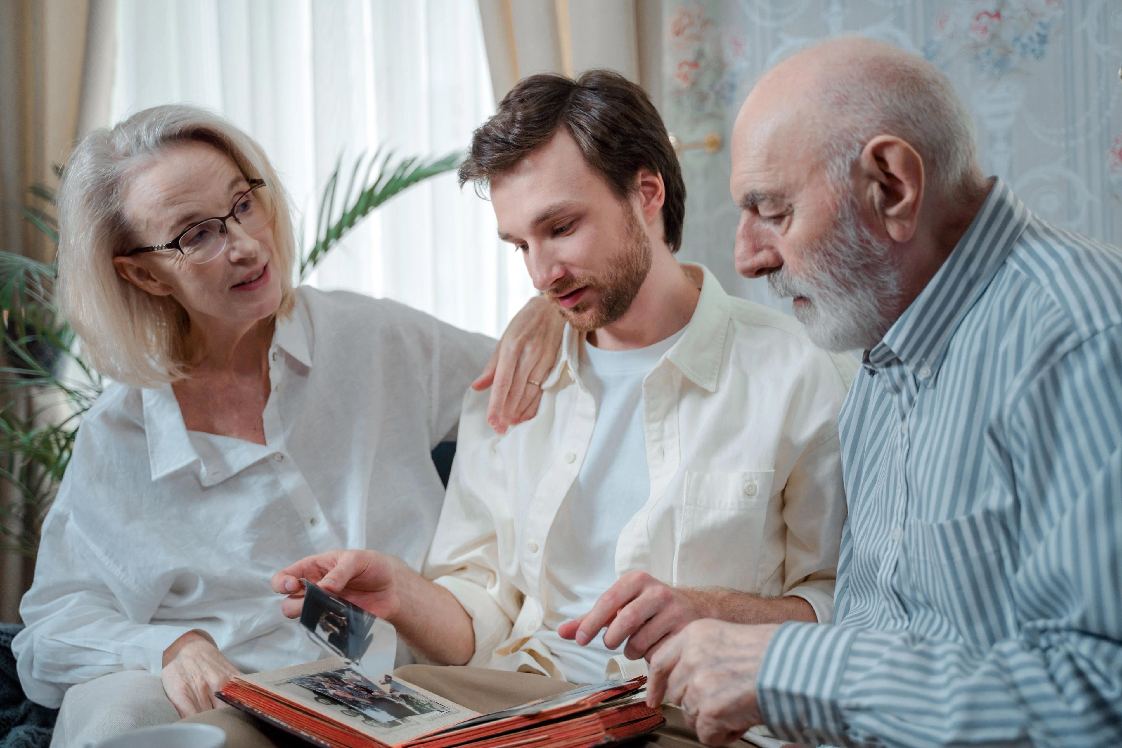 Son and parents looking at memories