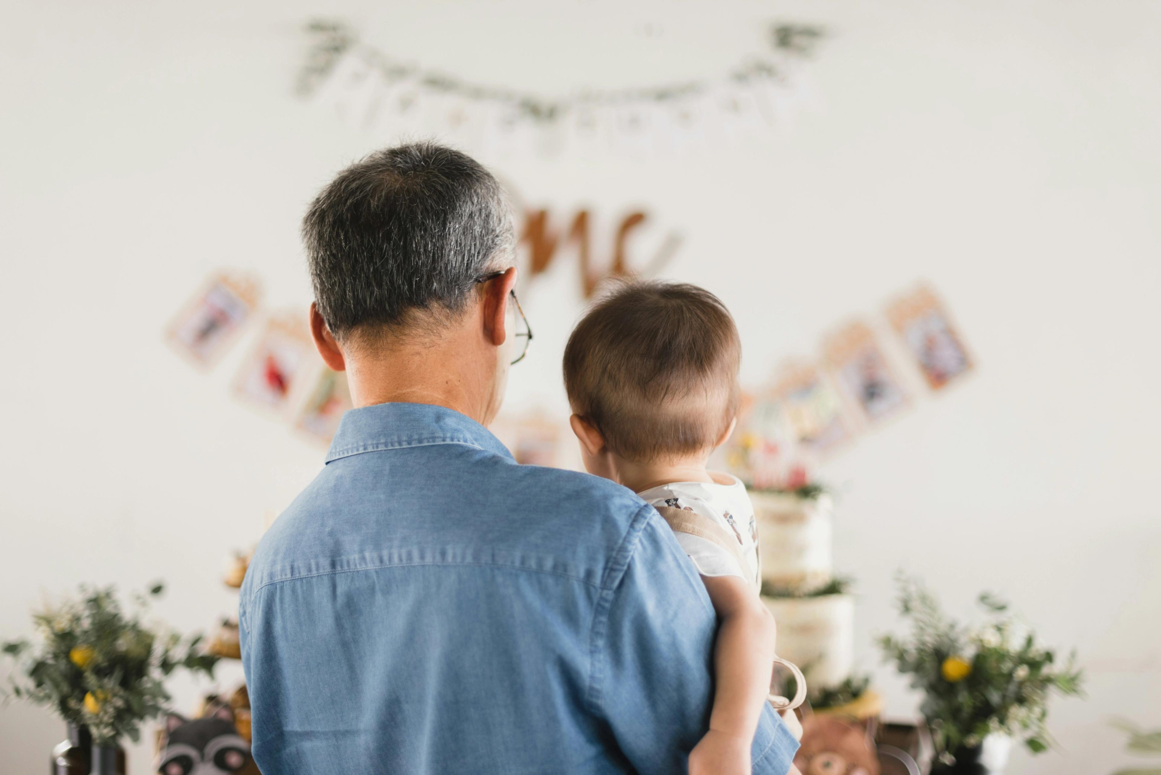 Father holding a son