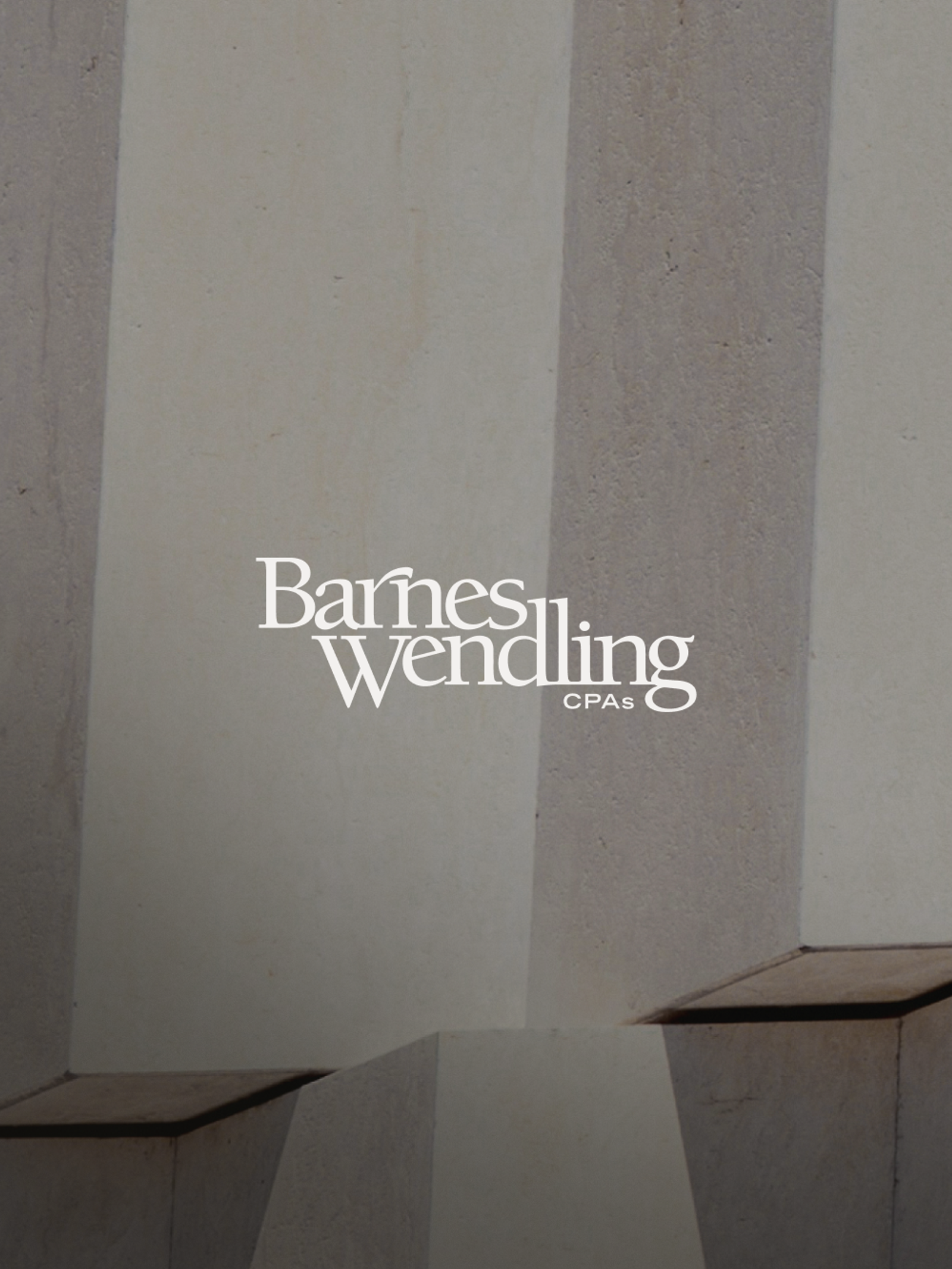 The Barnes Wendling CPAs logo in white text on a textured, light and dark striped background.