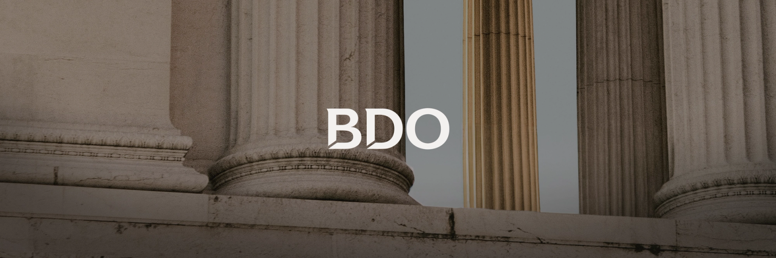 The text "BDO" overlaid on a background of classical stone columns.