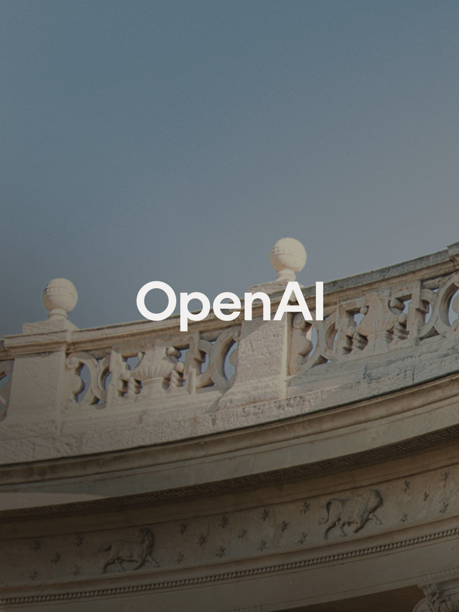 White OpenAI logo over an ornate stone balustrade and blue sky.