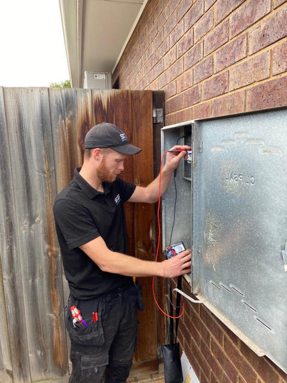 Karl performing residential electrical testing