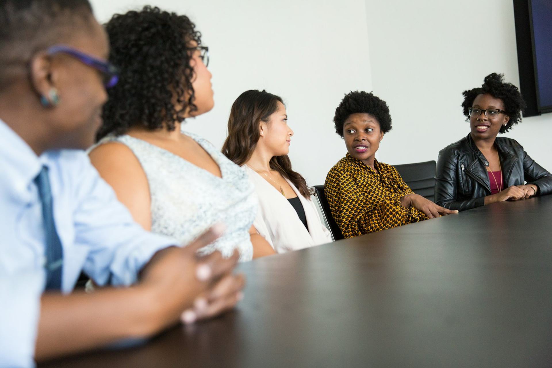 Cyber professionals in a boardroom discussion