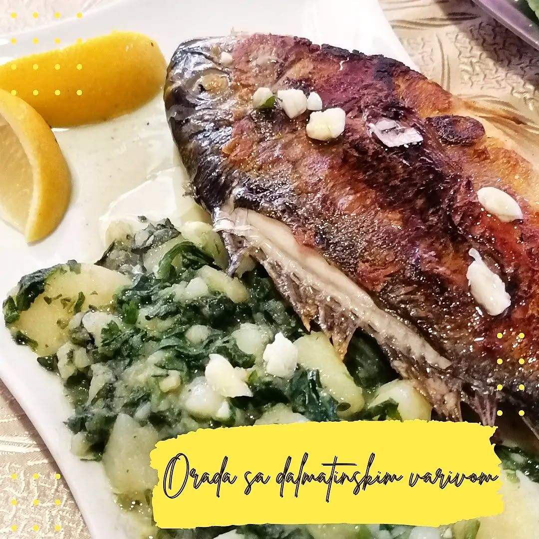 A perfectly grilled whole sea bream (orada) served with a traditional Dalmatian side dish of potatoes and chard.